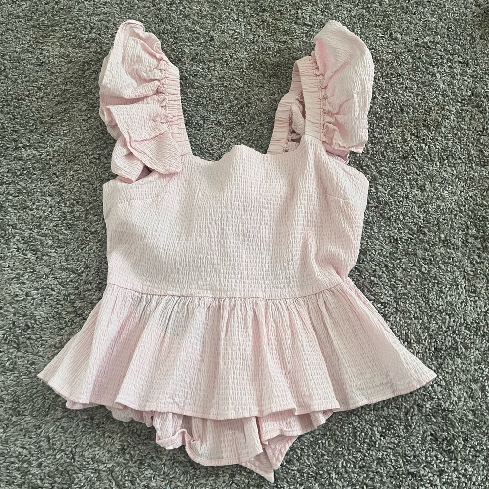 Francesca’s light pink bow top
